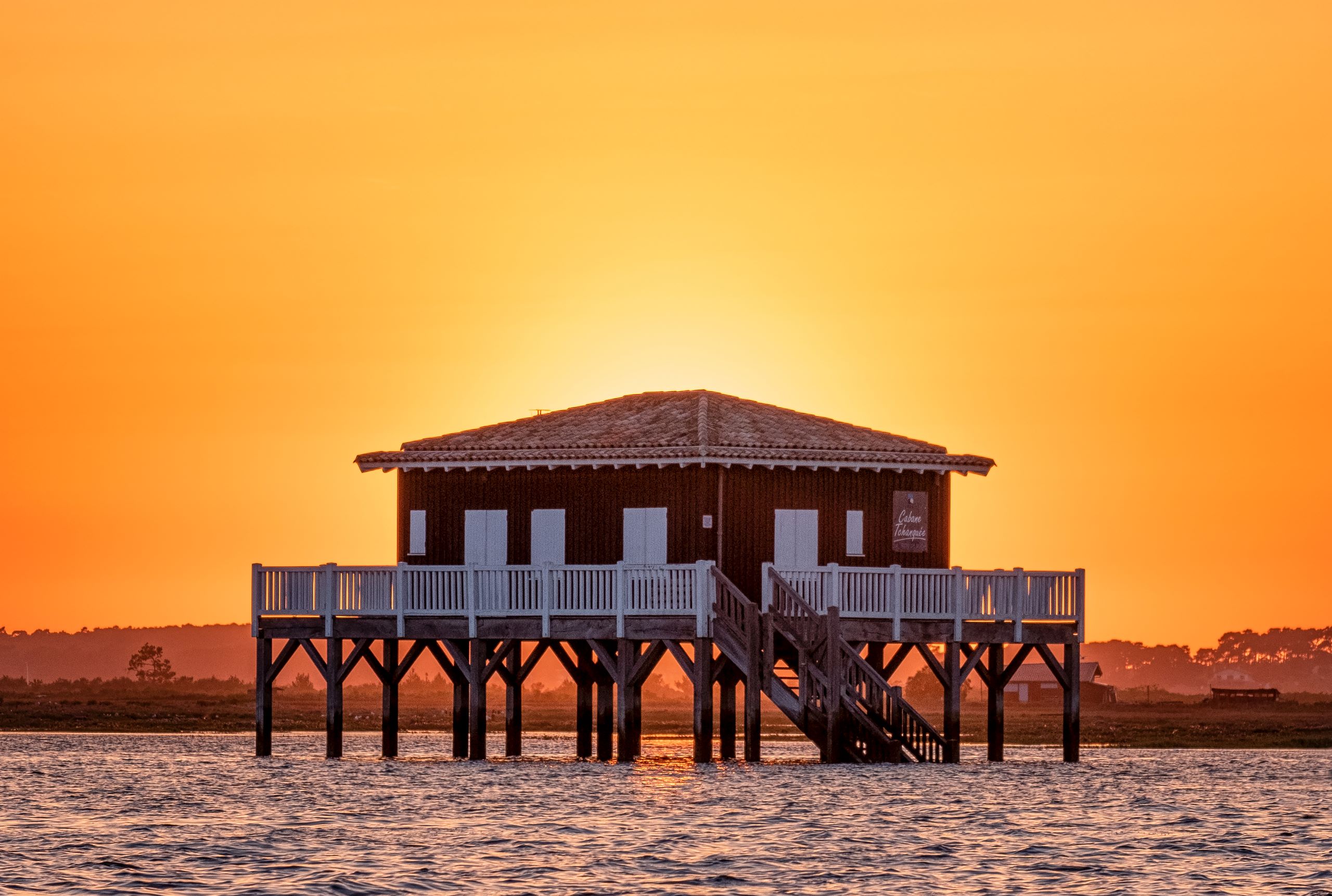 Cabane à l'orange, cabane Tchanquée au coucher du soleil, Bassin d'Arcachon